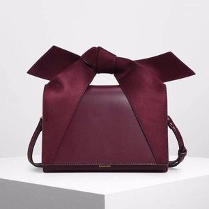 Charles & Keith bow top handle crossbody bag burgundy♥️